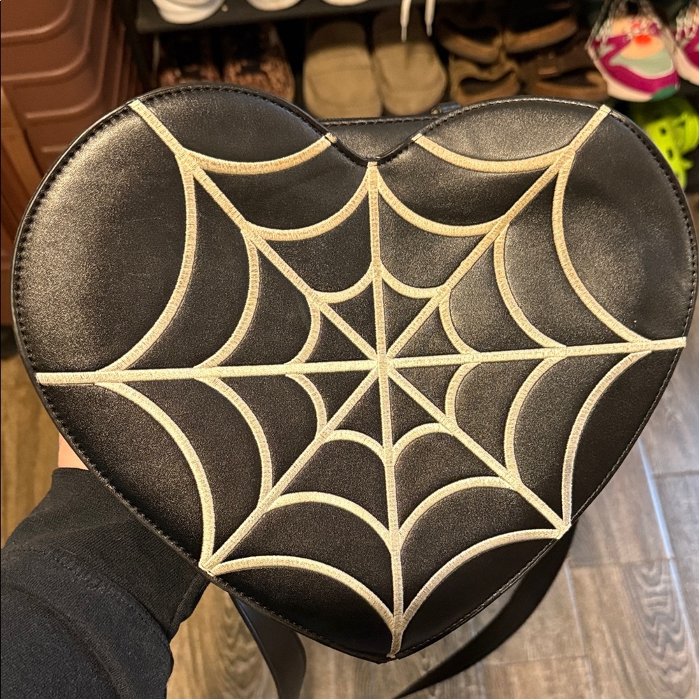Heart-Shaped Black Bag with Spider Web Design